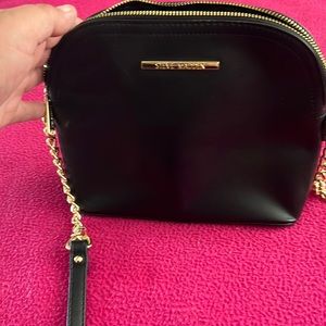 Steve Madden with pink wallet